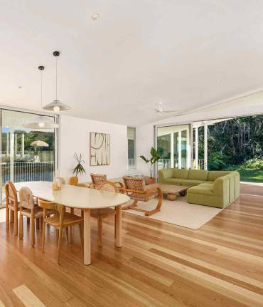 Solid timber flooring in an open plan living and dining area